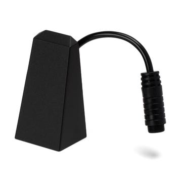 The simple, unobtrusive wedge is subtle by day but shines beautiful light downward after dark