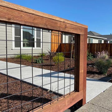 Wild Hog Railing delivers hog wire fence panels in a rich textured black finish perfect for nearly any deck style.