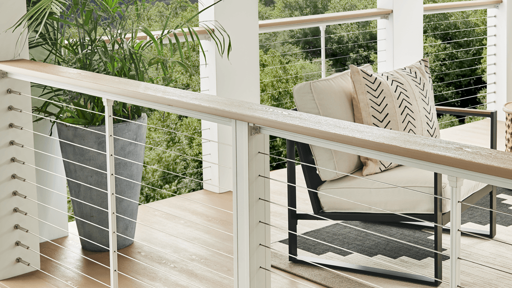 Elevating Deck with a Built-In Drink Rail